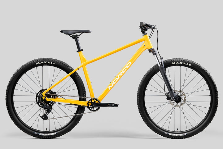 26 Norco Storm 100 Golden Larch side-profile product image