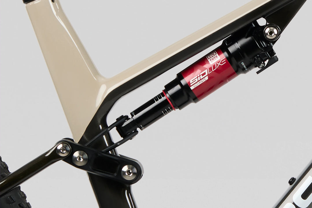 26 Norco Revolver C1 120 Fast Black Raw Carbon Warm Grey rear shock product image