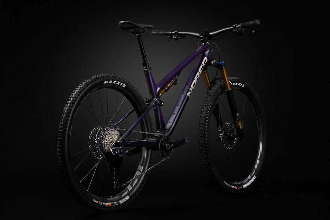 26 Norco Revolver C1 130 Royal Purple Raw Carbon rear quarter product image