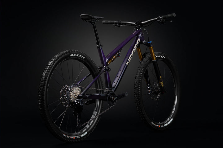 26 Norco Revolver C1 130 Royal Purple Raw Carbon rear quarter product image