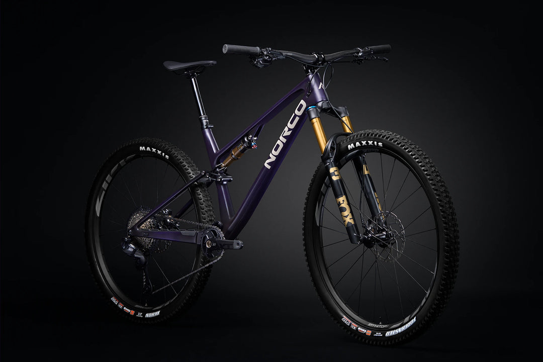 26 Norco Revolver C1 130 Royal Purple Raw Carbon quarter-view product image