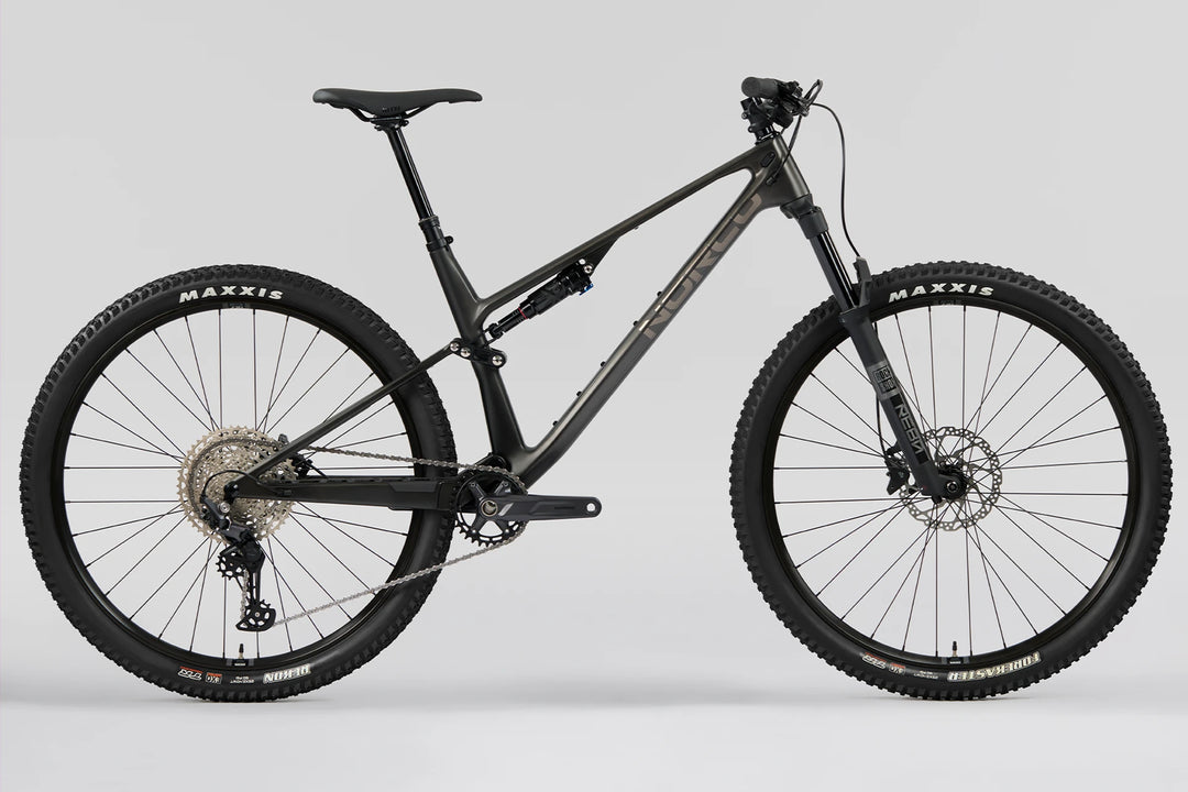 26 Norco Revolver C3 130 Fast Black Raw Carbon side-view product image